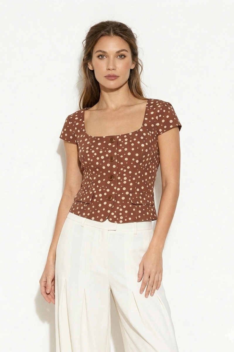 Brown polka dot square neck short sleeve top with button front and pocket flap detail