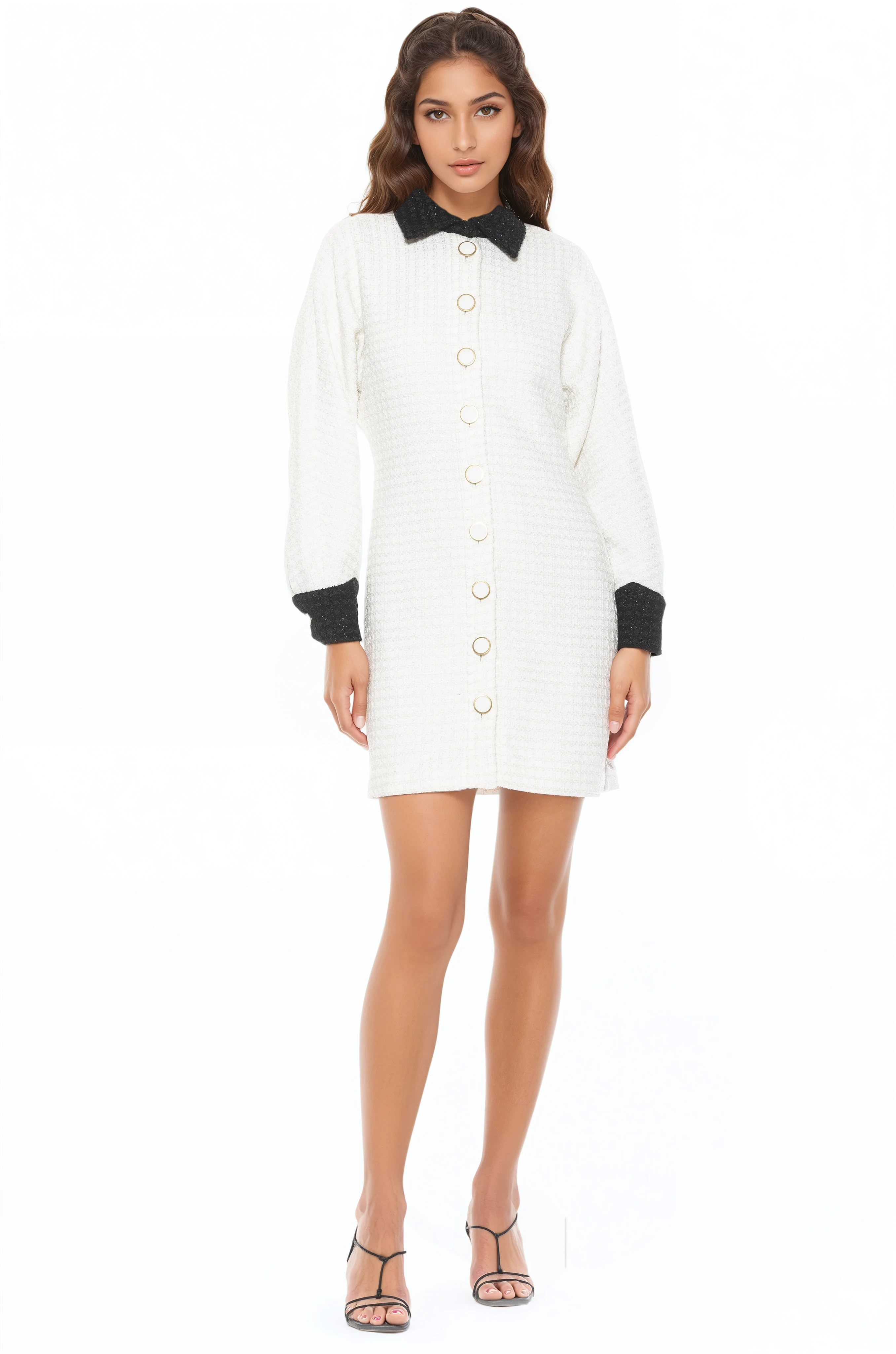 Front view ivory tweed mini dress, long sleeves, contrast black collar and cuffs, gold rimmed ivory button front.