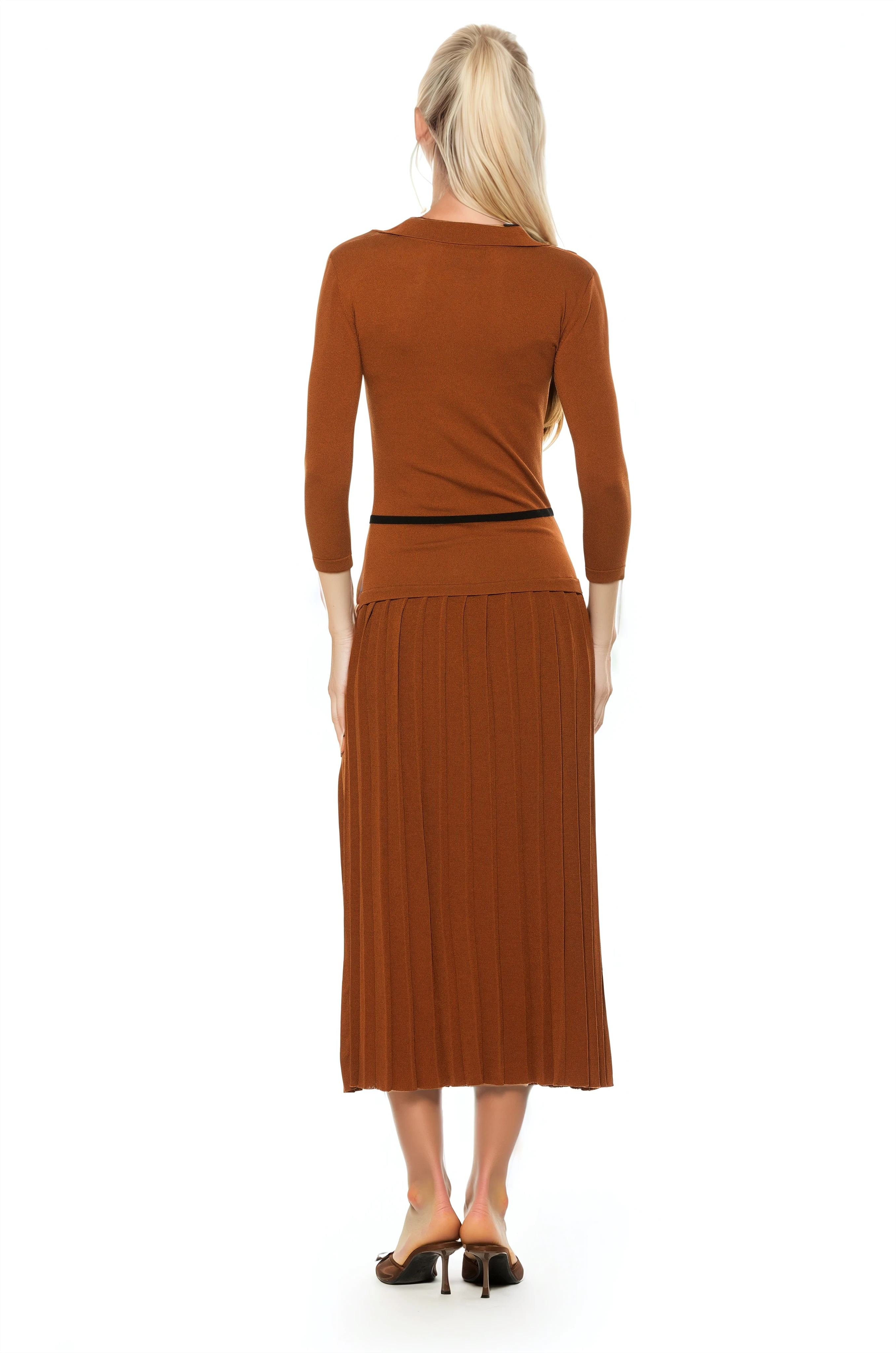 Back view camel knit midi dress with drop waist, contrast black detail, pleated bottom, knit collar and 3/4 sleeves.