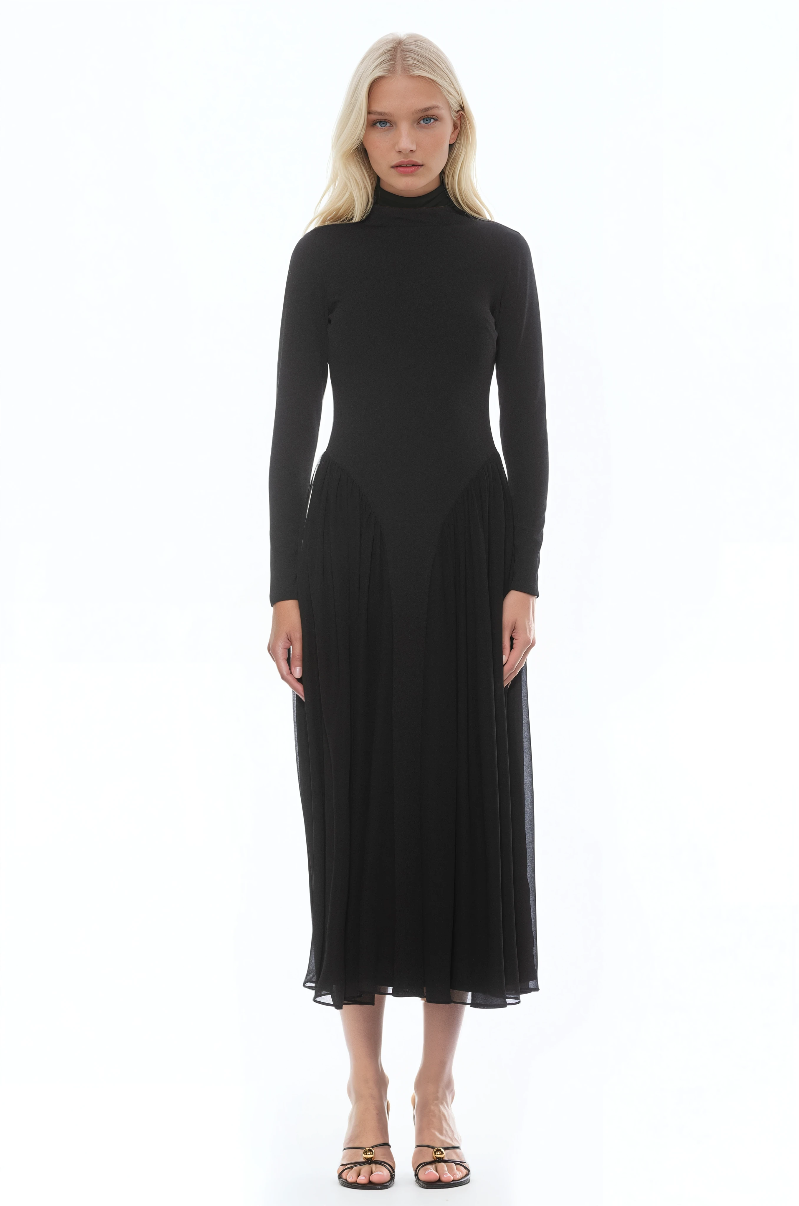 Front view black long sleeve midi dress sheered drop waist detail, mock neck.