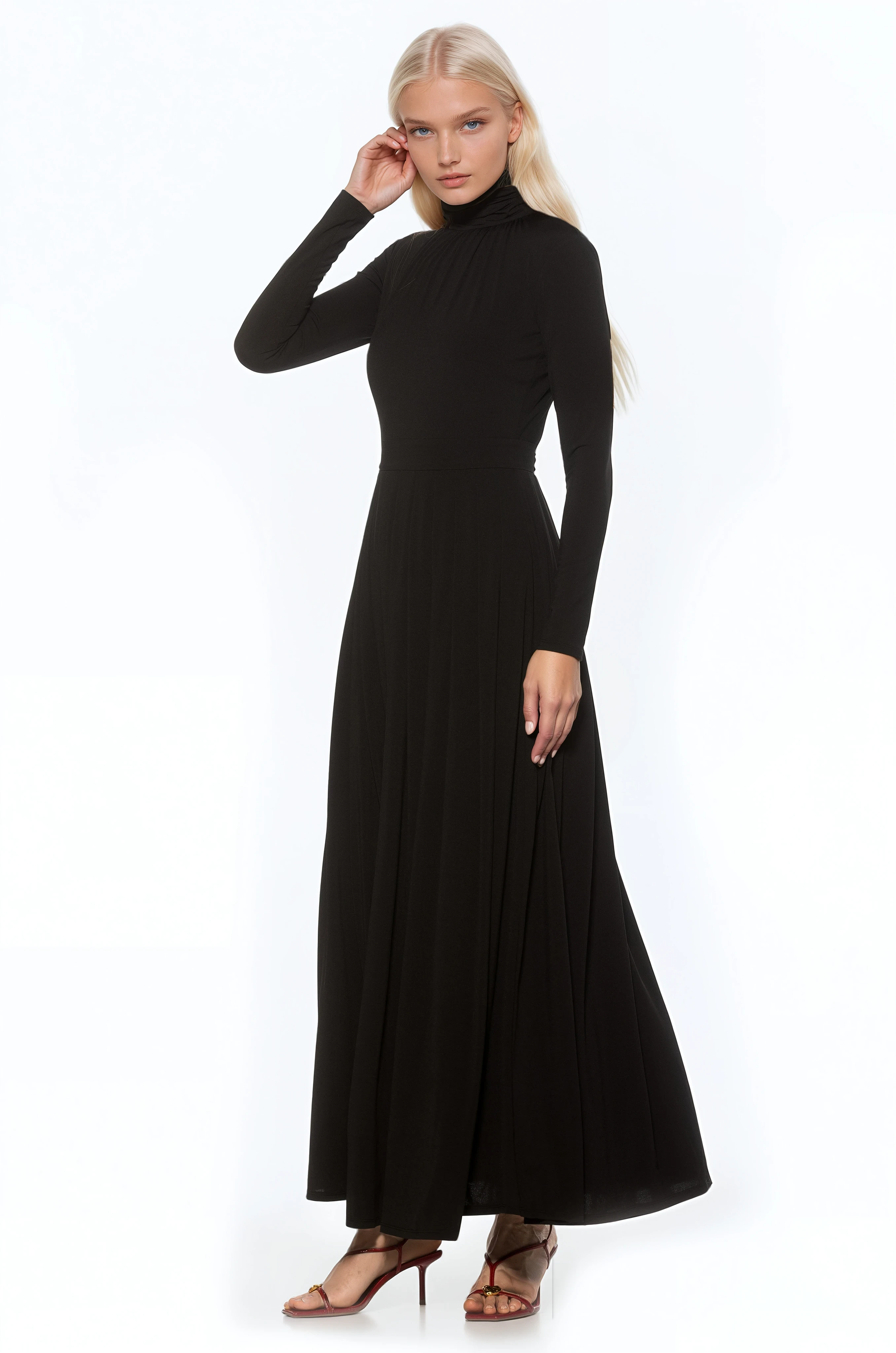 Side view black long sleeve maxi dress, mock neck, pleated skirt.