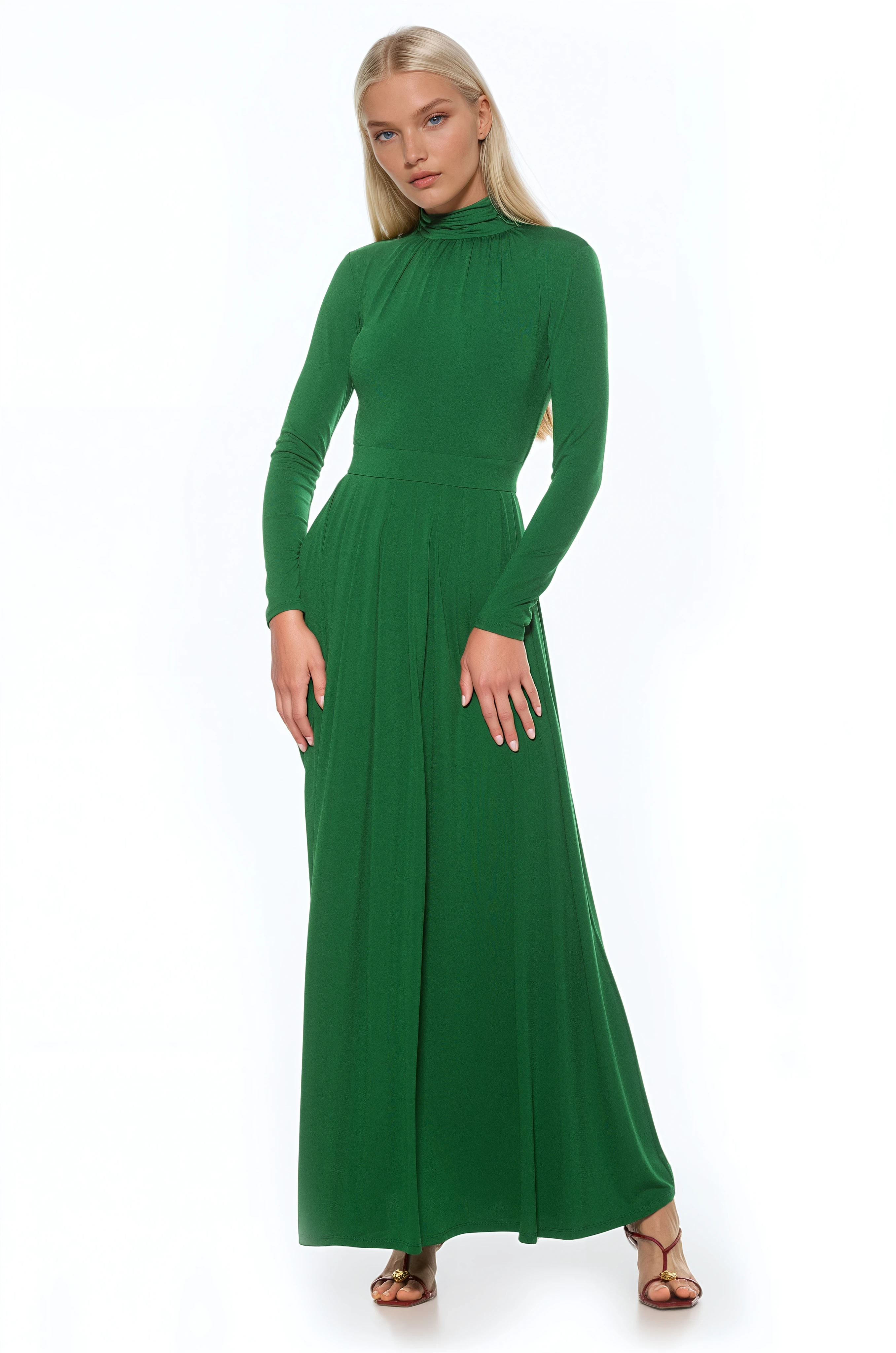 Front view emerald green long sleeve maxi dress, mock neck, pleated skirt.