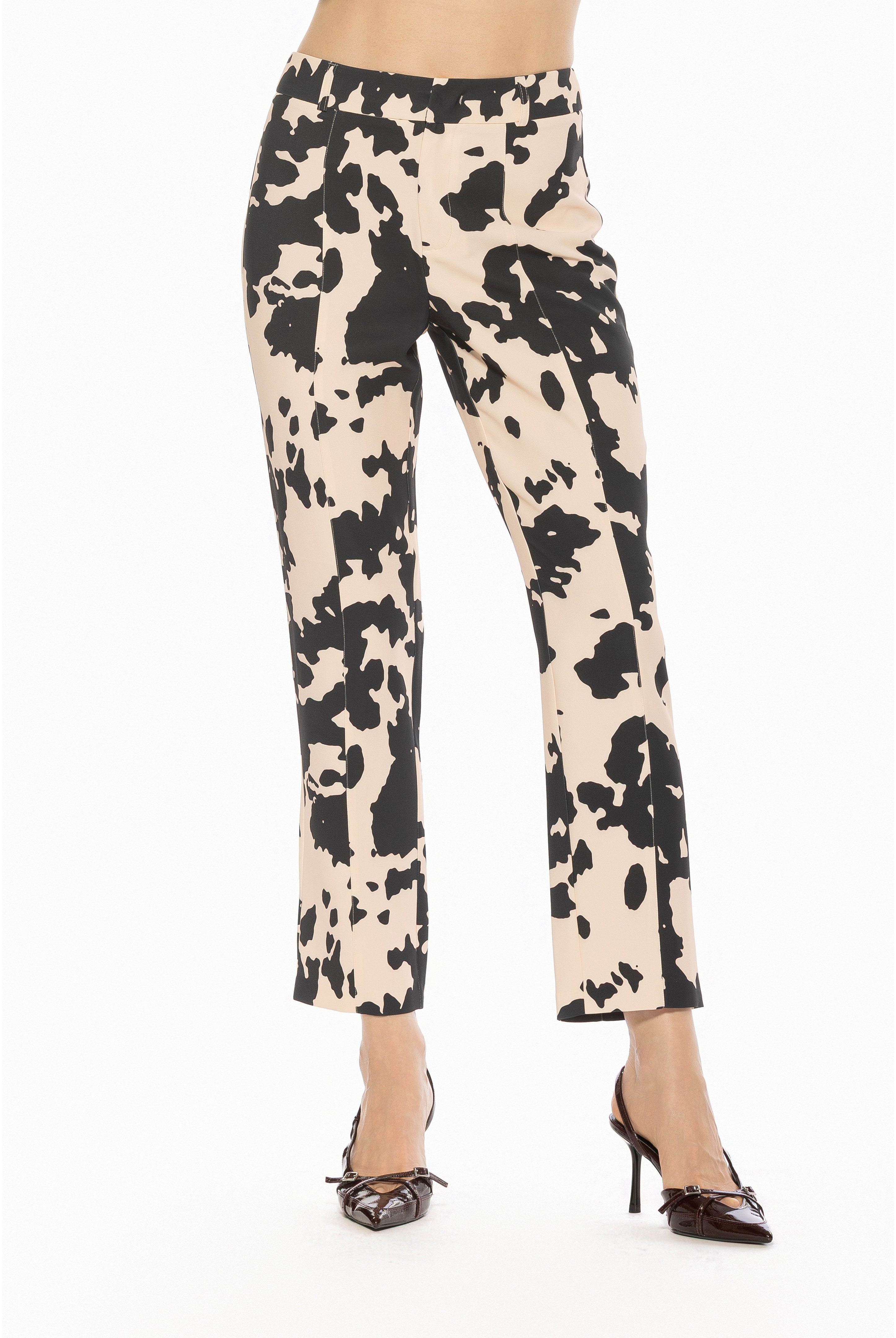 Front view cow print slim fit pant, clean front, no pockets, no fly.