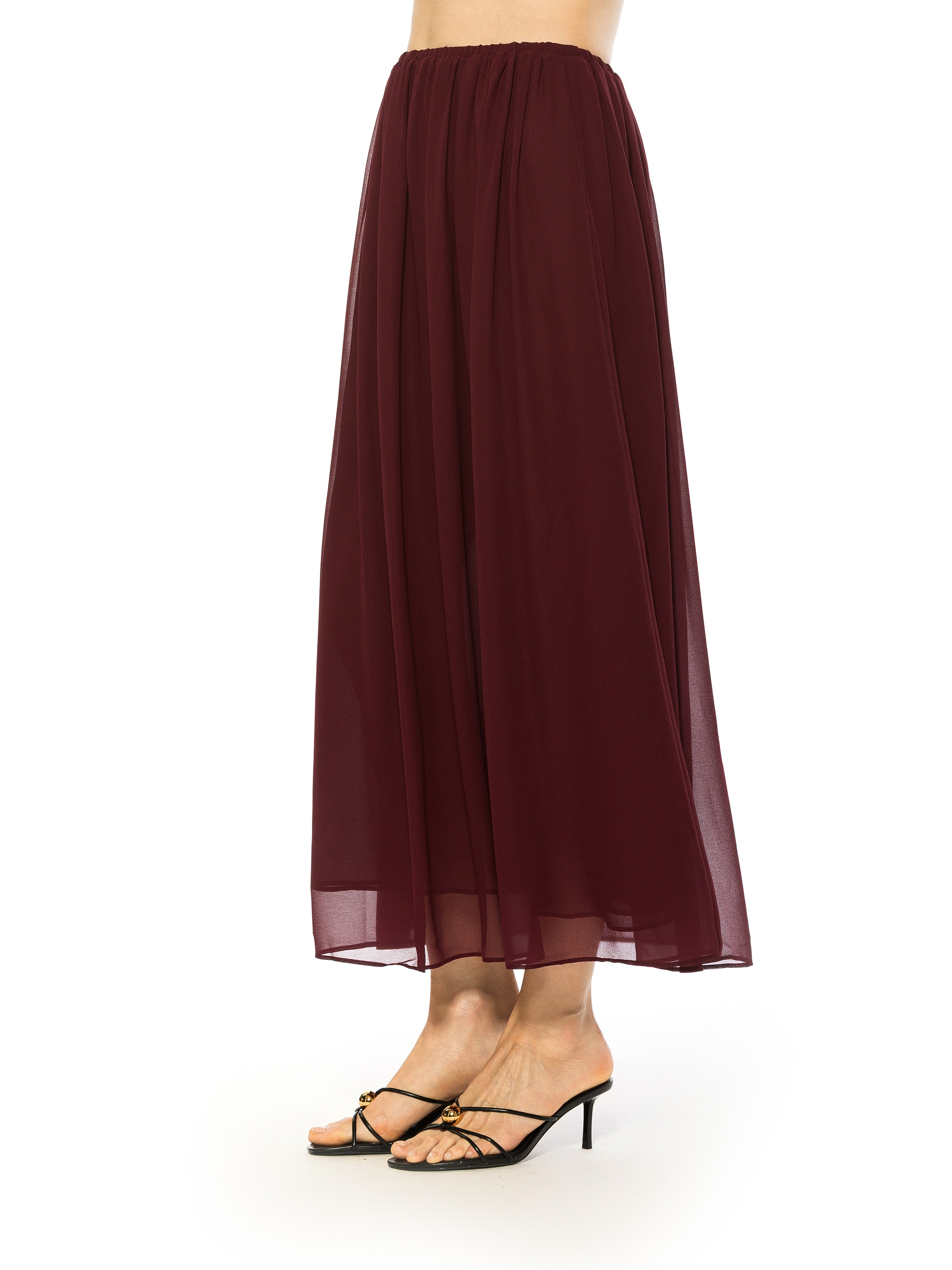 Side view burgundy max skirt elastic waist.