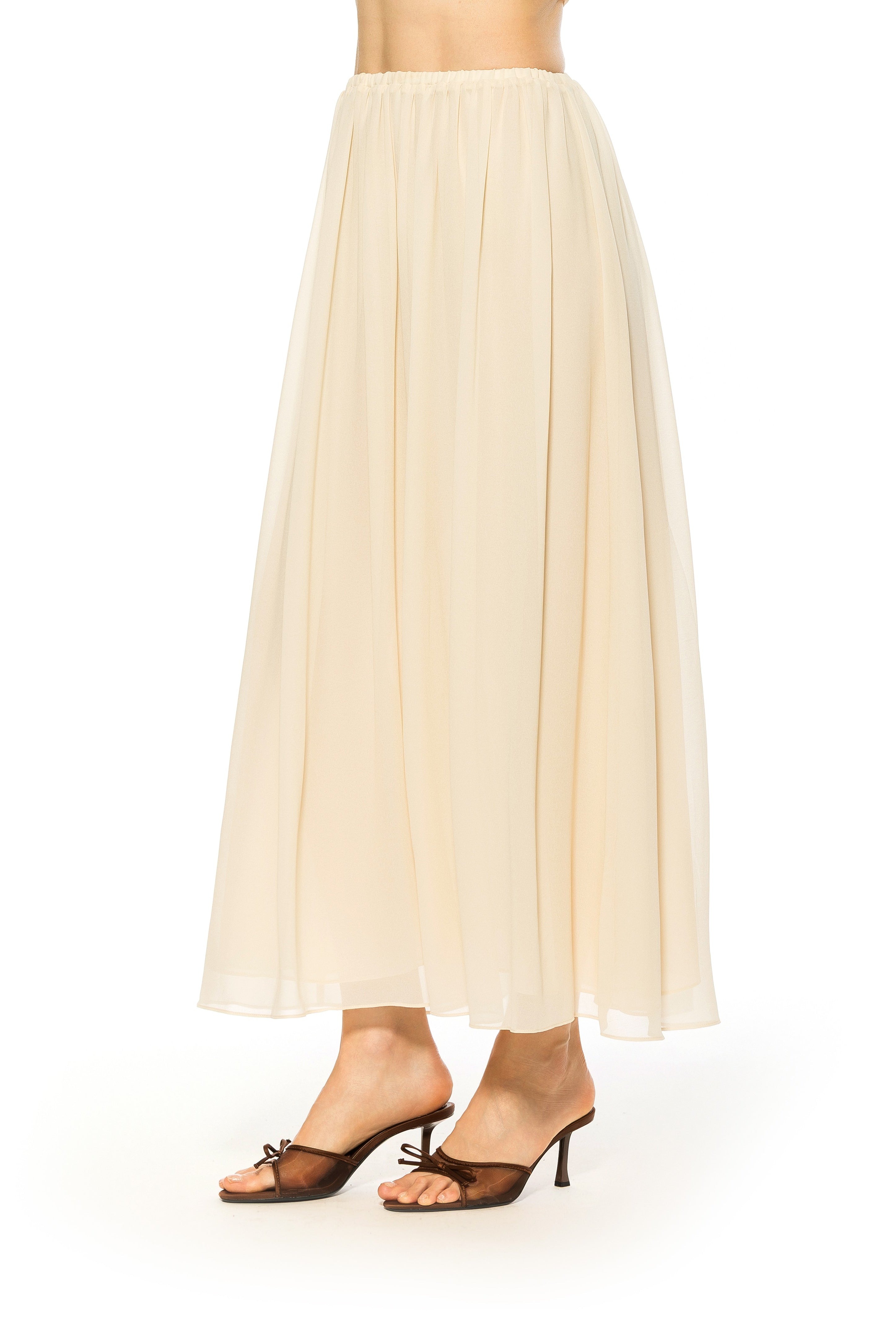 Side view ivory max skirt elastic waist.