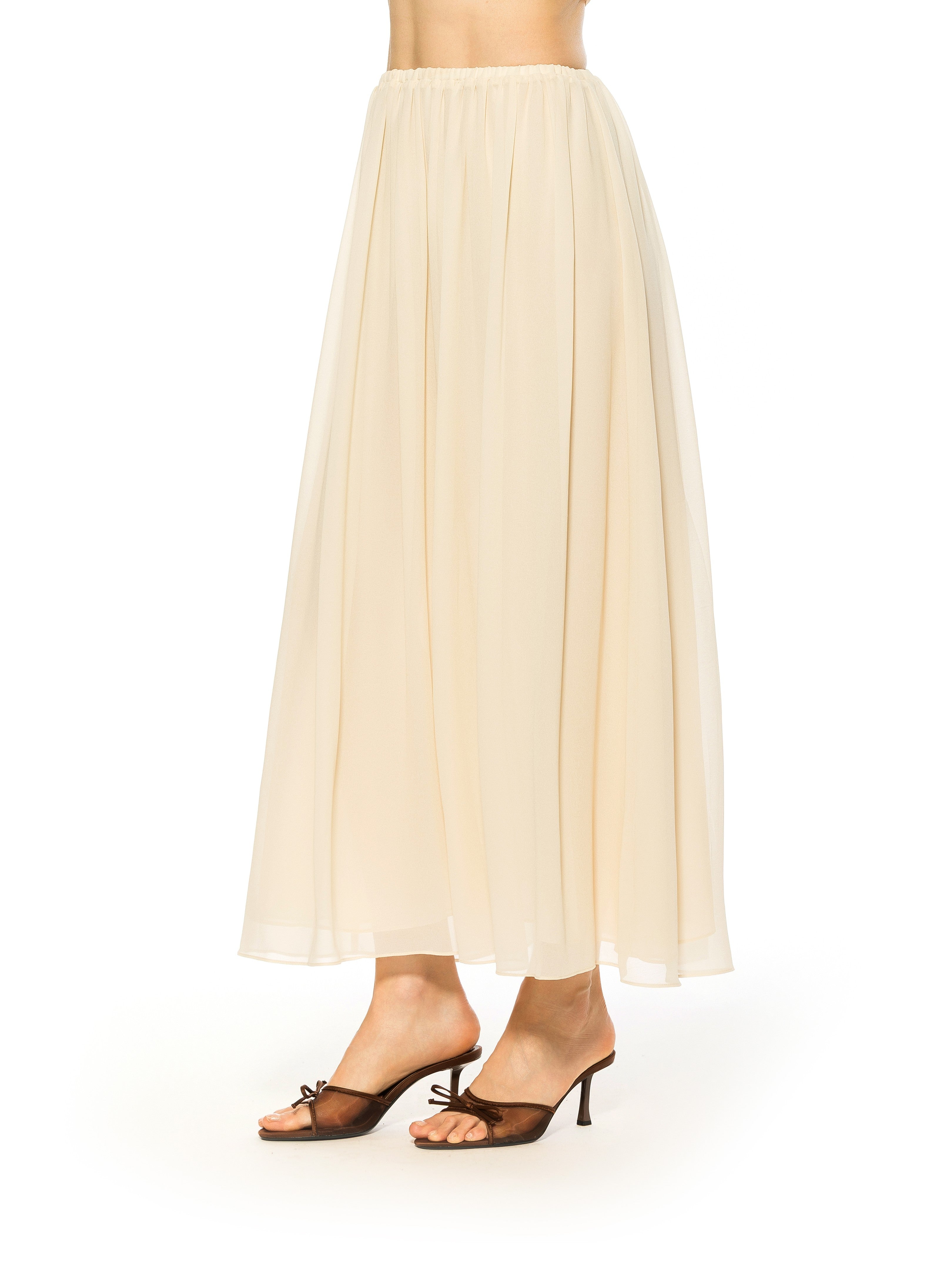 Side view ivory max skirt elastic waist.