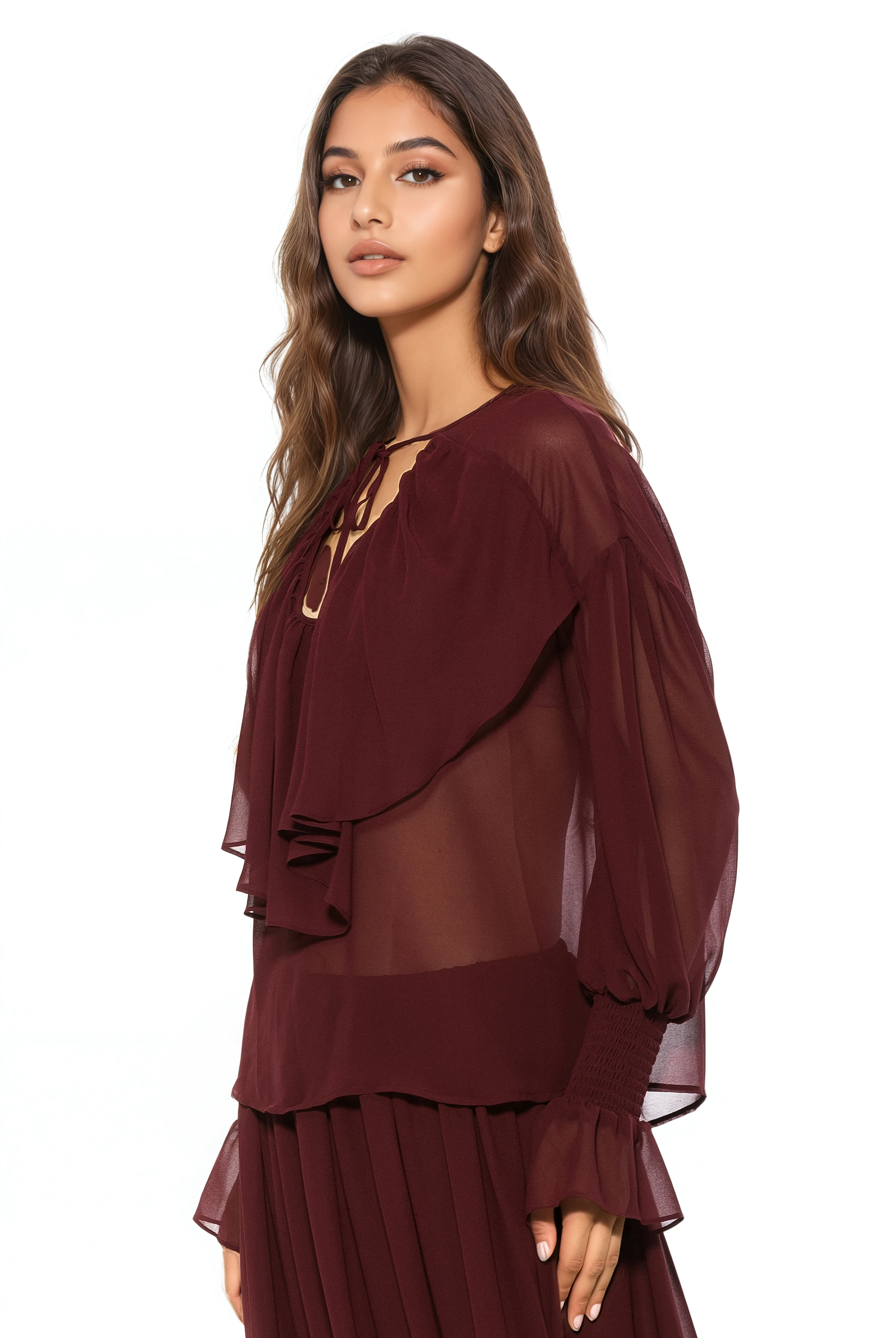 Side view burgundy ruffle blouse, v-neck front neck tie, blouson sleeve with smocked ruffle cuff.