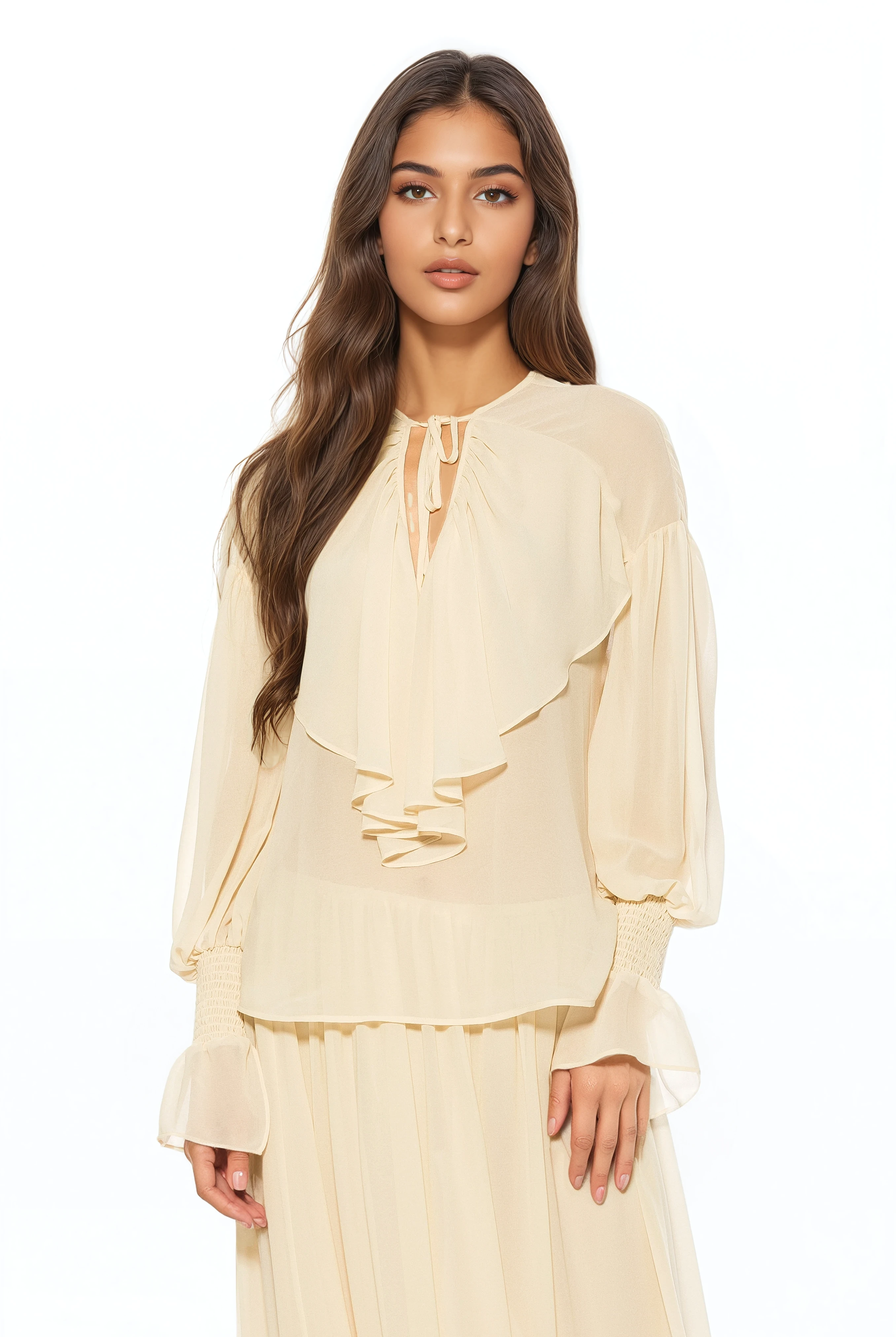 Front view ivory ruffle blouse, v-neck front neck tie, blouson sleeve with smocked ruffle cuff.