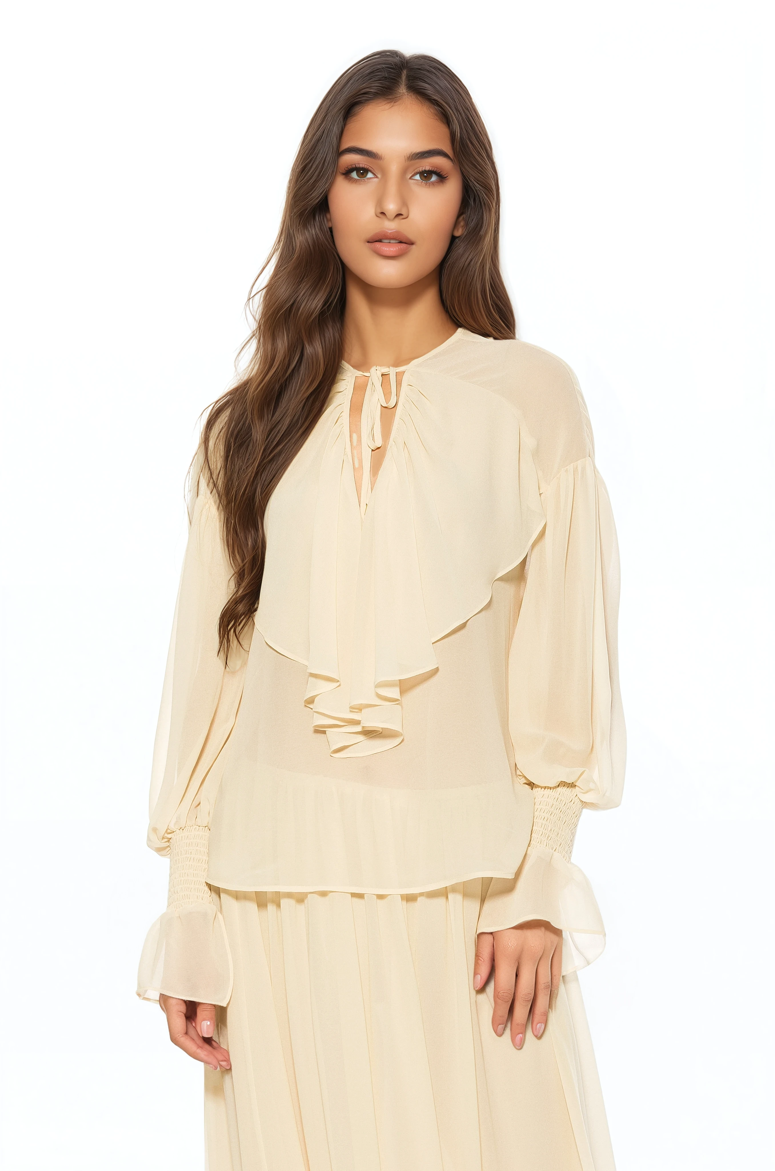 Front view ivory ruffle blouse, v-neck front neck tie, blouson sleeve with smocked ruffle cuff.