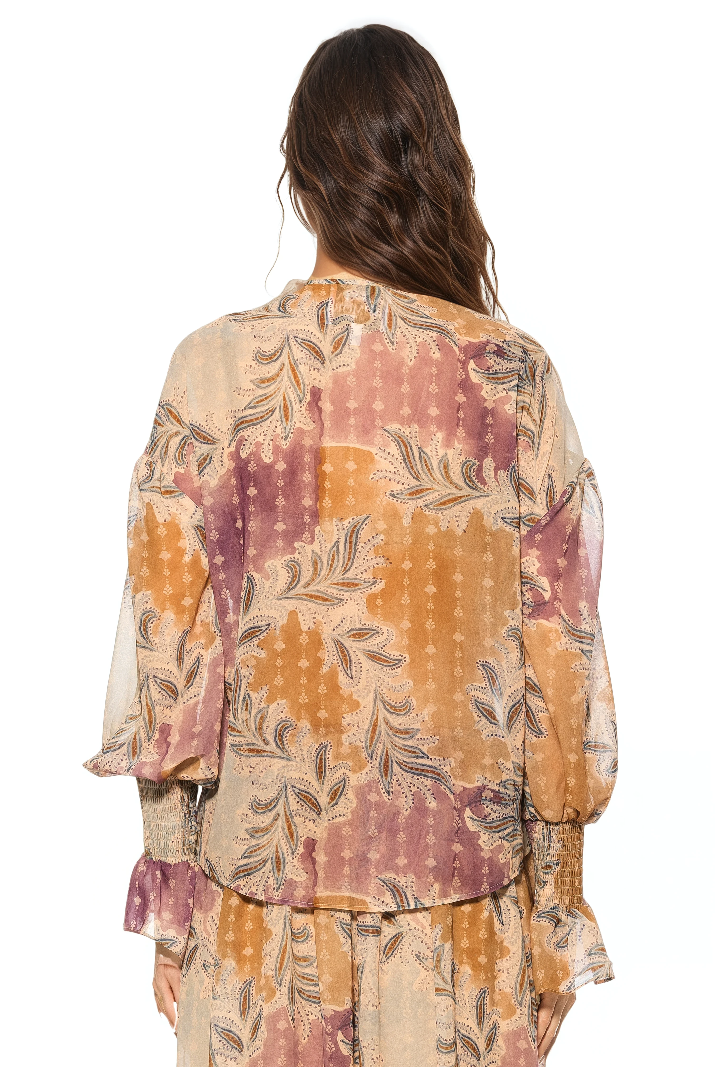 Back view paisley print ruffle blouse, shirt tail hem, blouson sleeve with smocked ruffle cuff.
