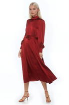 Front view burgundy maxi dress, long sleeve, blouson sleeves with wide cuffs, belted.