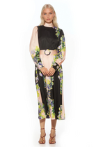 Front view black and cream floral maxi dress, long sleeve, blouson sleeves with wide cuffs, belted.