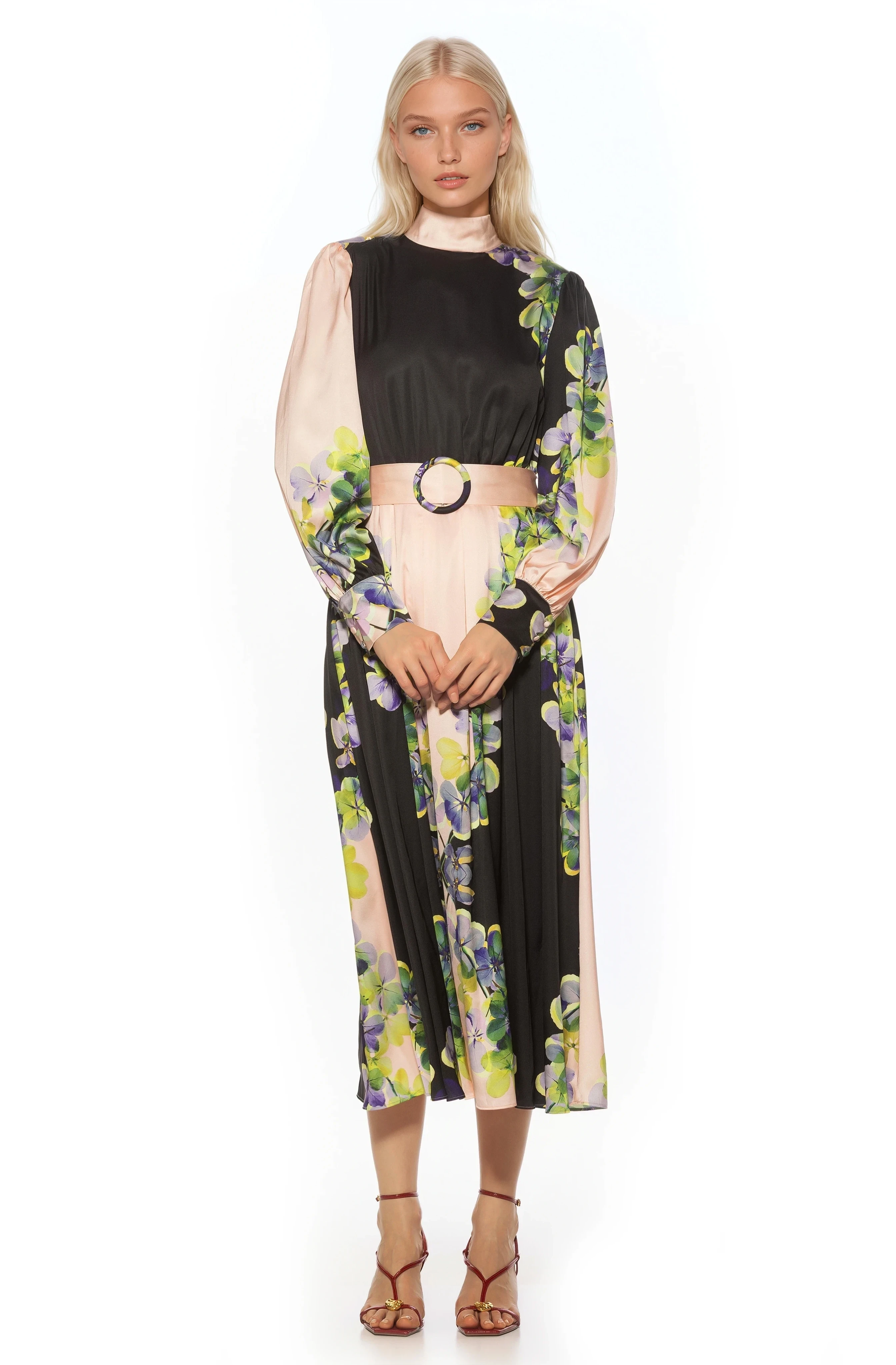 Front view black and cream floral maxi dress, long sleeve, blouson sleeves with wide cuffs, belted.