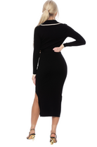 Side view black midi dress, long sleeves, surplice neck, ivory contract detail, side slit.