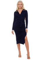 Front view navy midi dress, long sleeves, surplice neck, ivory contract detail, side slit.
