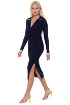 Side view navy midi dress, long sleeves, surplice neck, ivory contract detail, side slit.