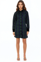 Front view green plaid mini dress, long sleeves, contrast black collar and cuffs, plaid button front.