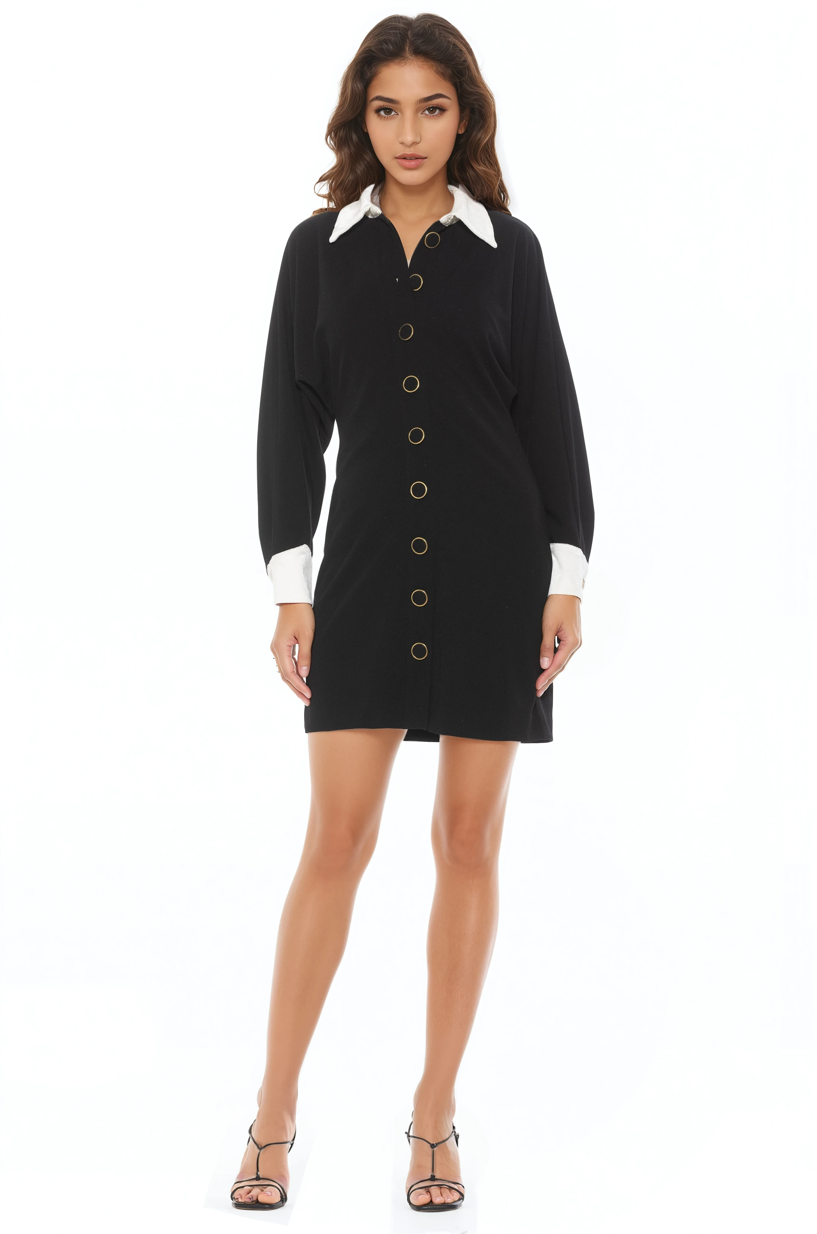 Front view black mini dress, long sleeves, contrast ivory collar and cuffs, gold rimmed black button front.