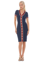 Front view navy v-neck knit dress, short sleeve, contrast red and ivory trim with gold button detailing.