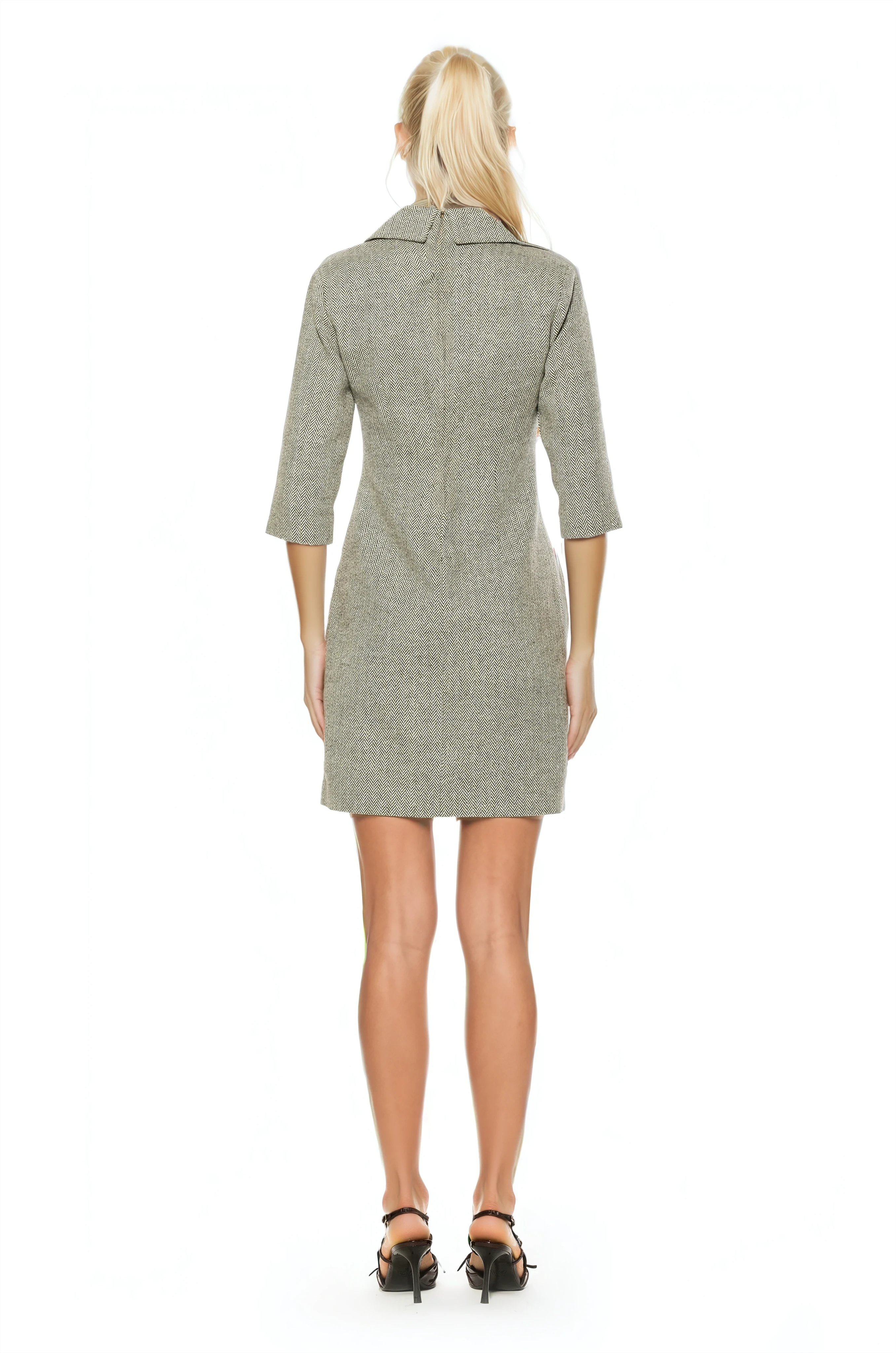 Back view herringbone shift dress, 3/4 sleeve button front with dropped collar and flap pockets.
