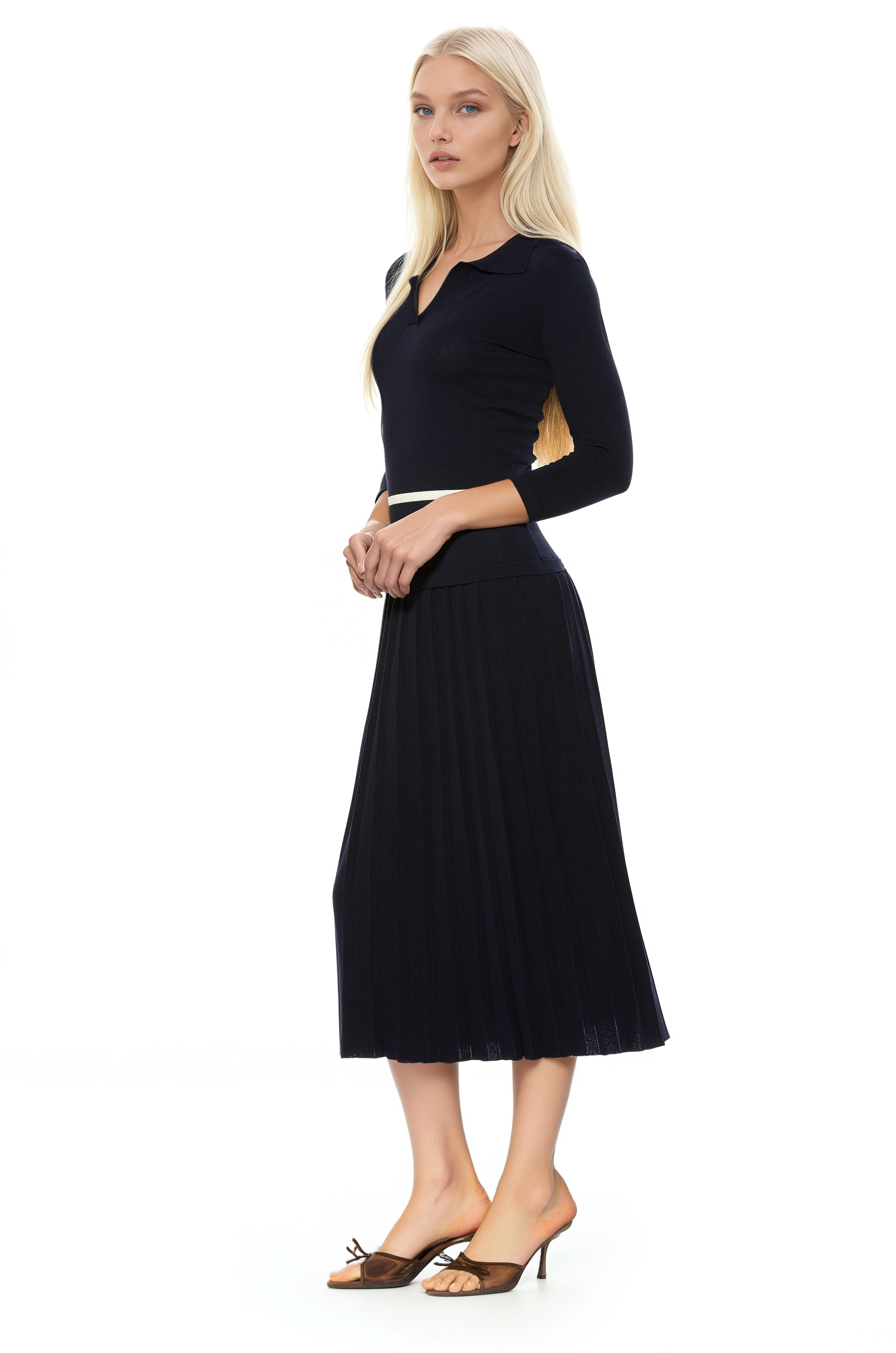 Side view black knit  midi dress with drop waist pleated bottom knit collar and 3/4 sleeves.