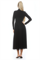 Back view black long sleeve midi dress sheered drop waist detail, mock neck.