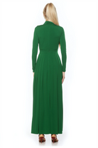 Back view emerald green long sleeve maxi dress, mock neck, pleated skirt.