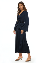 Side view navy maxi wrap dress, v-neck and flared sleeves.
