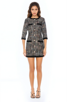 Front view tweed button front mini shift dress,  3/4 sleeve, black contrast pocket and hems, pearl and gold rim buttons.