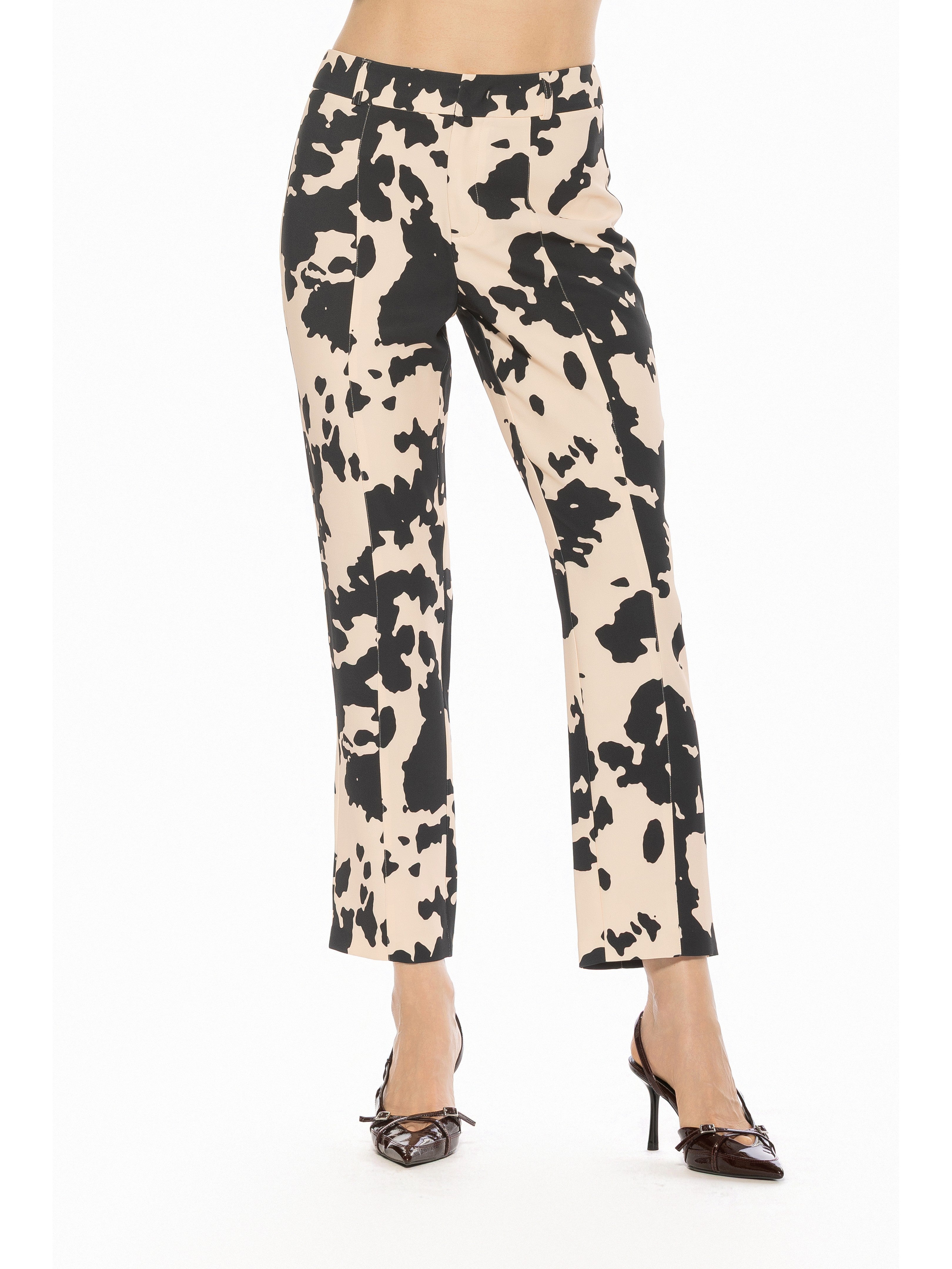 Front view cow print slim fit pant, clean front, no pockets, no fly.