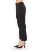 Side view black pinstripe slim fit pant no pockets, no fly.