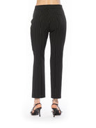Back view black pinstripe slim fit pant back welt pockets.