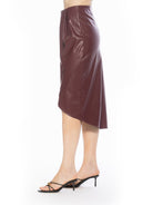 Side view burgundy midi skirt mock wrap front, soft drape.