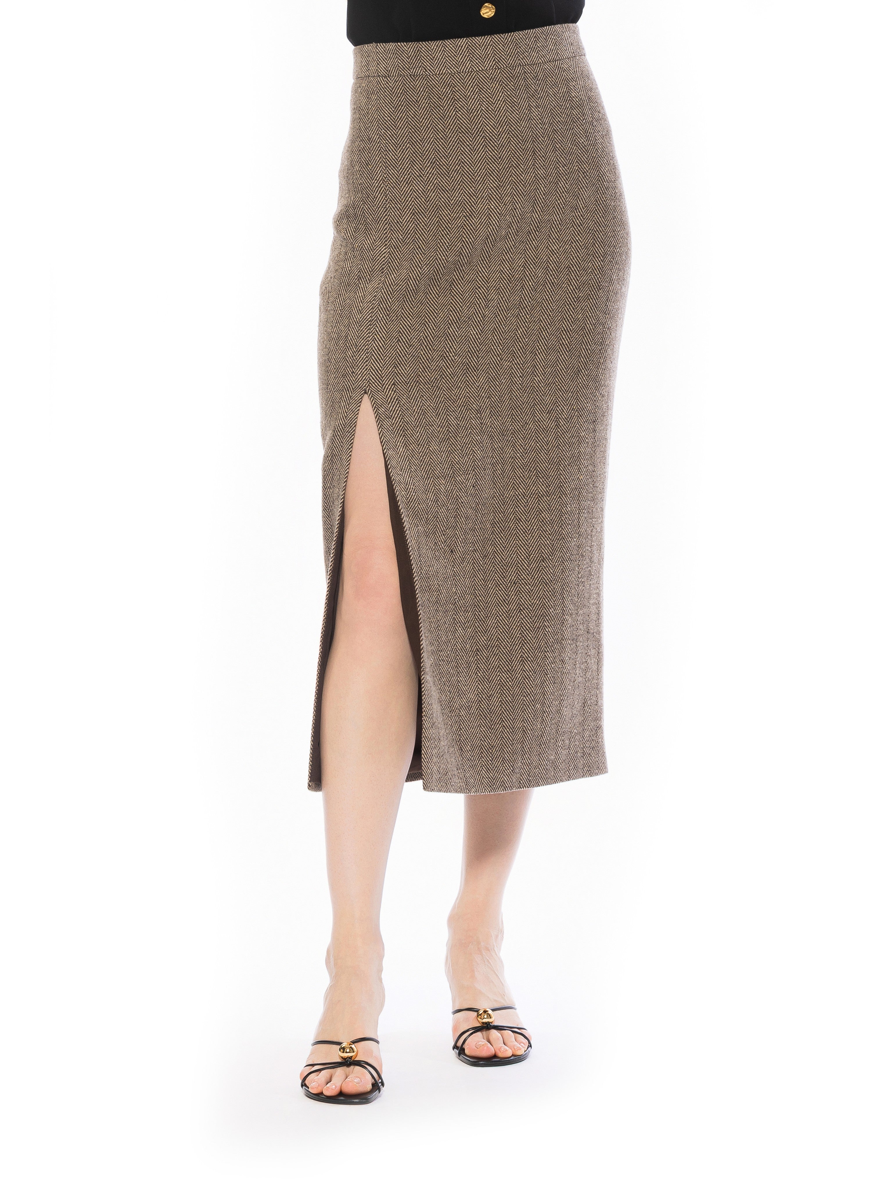 Front view herringbone tweed midi straight skirt with front side slit, flat front waistline.