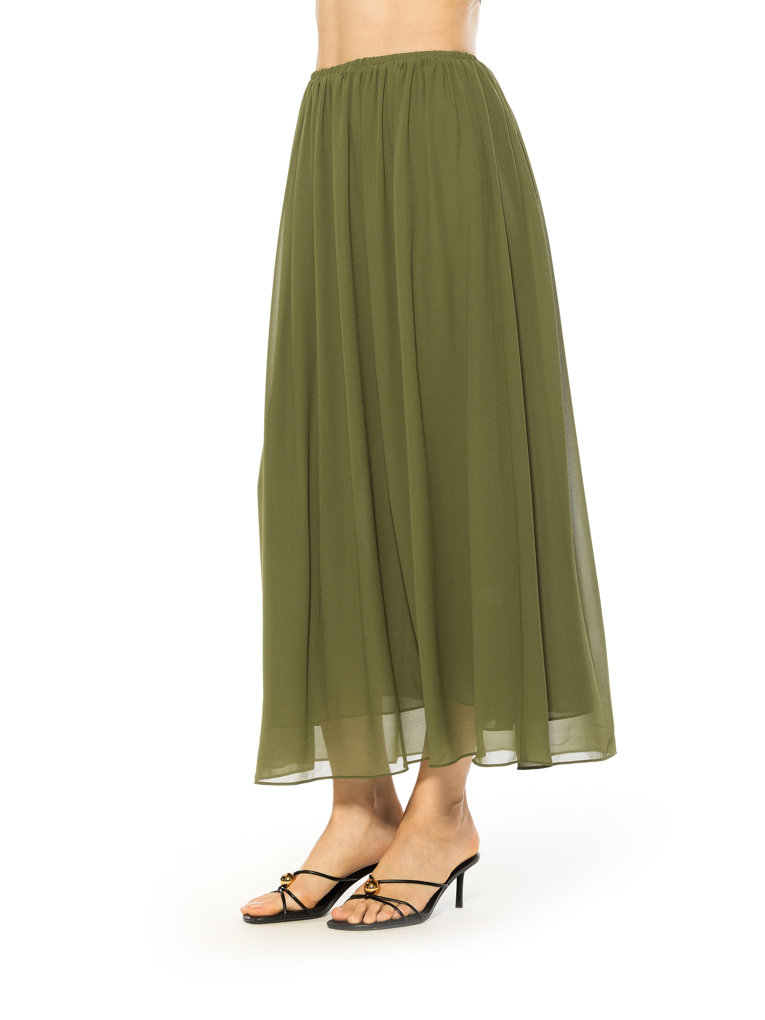 Side view green max skirt elastic waist.