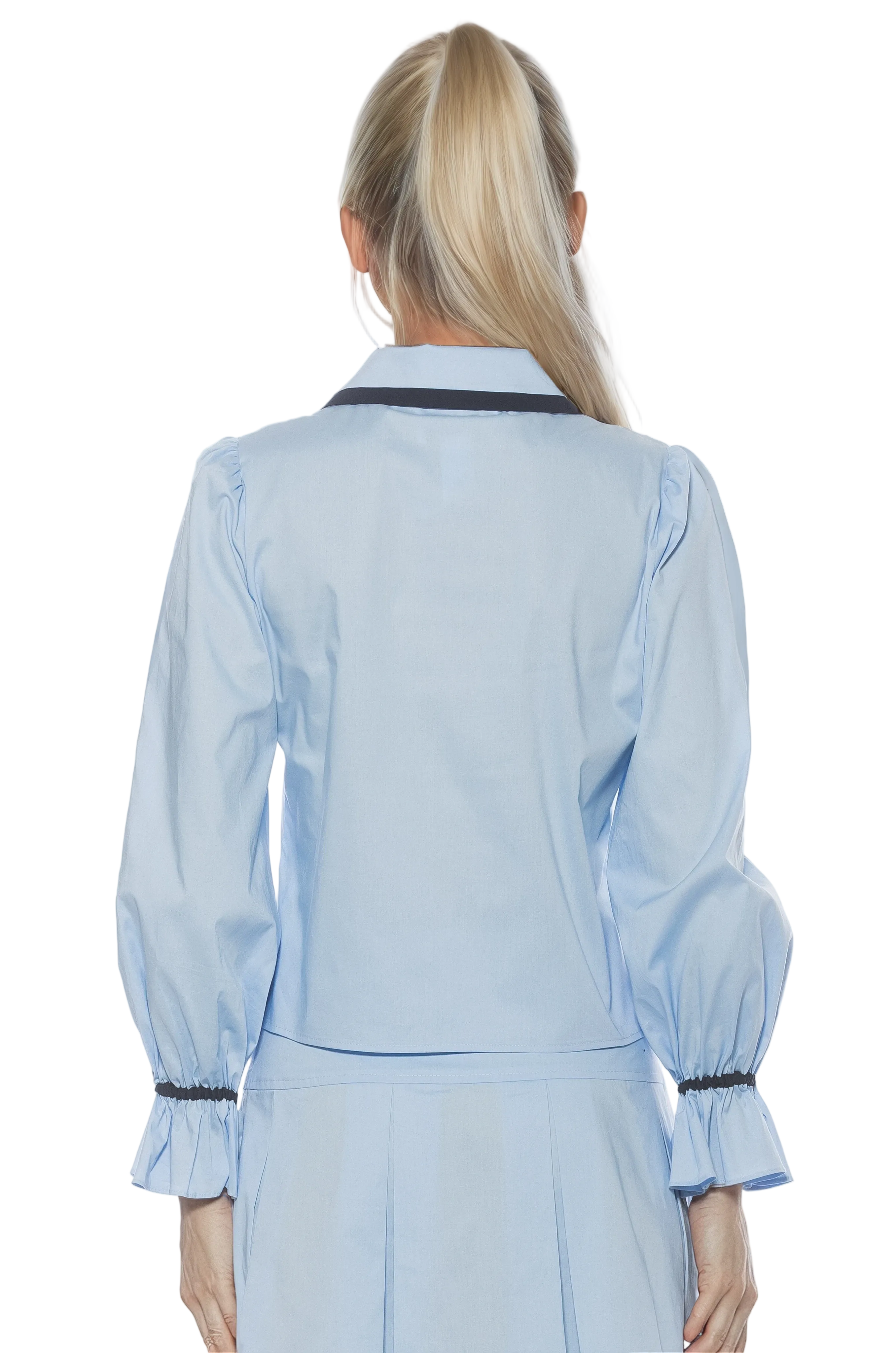 Back view blue blouse with black contrast detail on collar and cuffs and blouson sleeves.