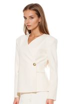 Side view ivory structured blazer, collarless, single button wrap front, flap pockets.