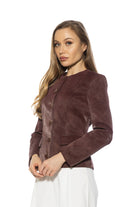 Side view burgundy structured crop blazer, collarless, gold rimmed buttons front flap pockets.