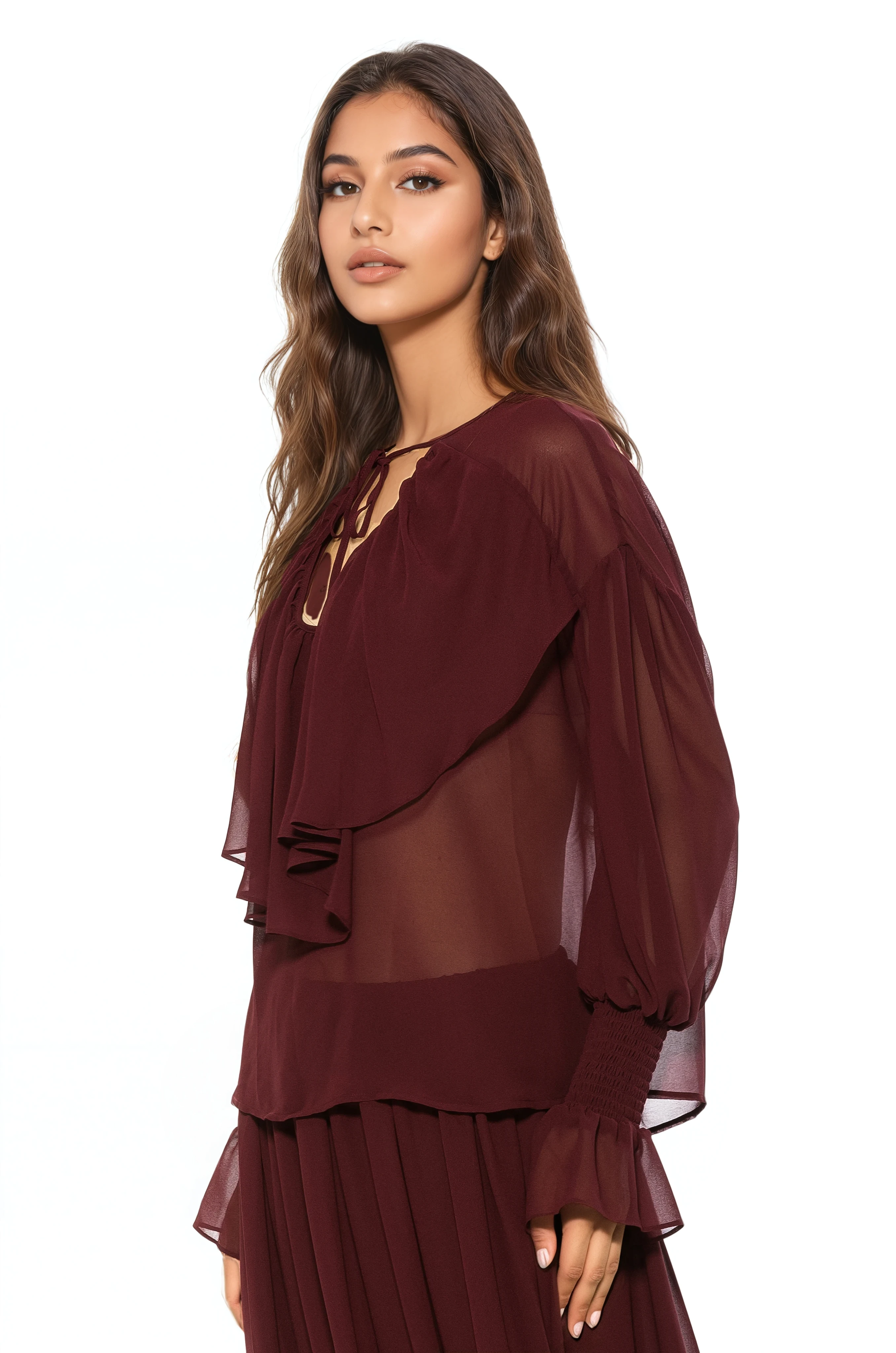 Side view burgundy ruffle blouse, v-neck front neck tie, blouson sleeve with smocked ruffle cuff.