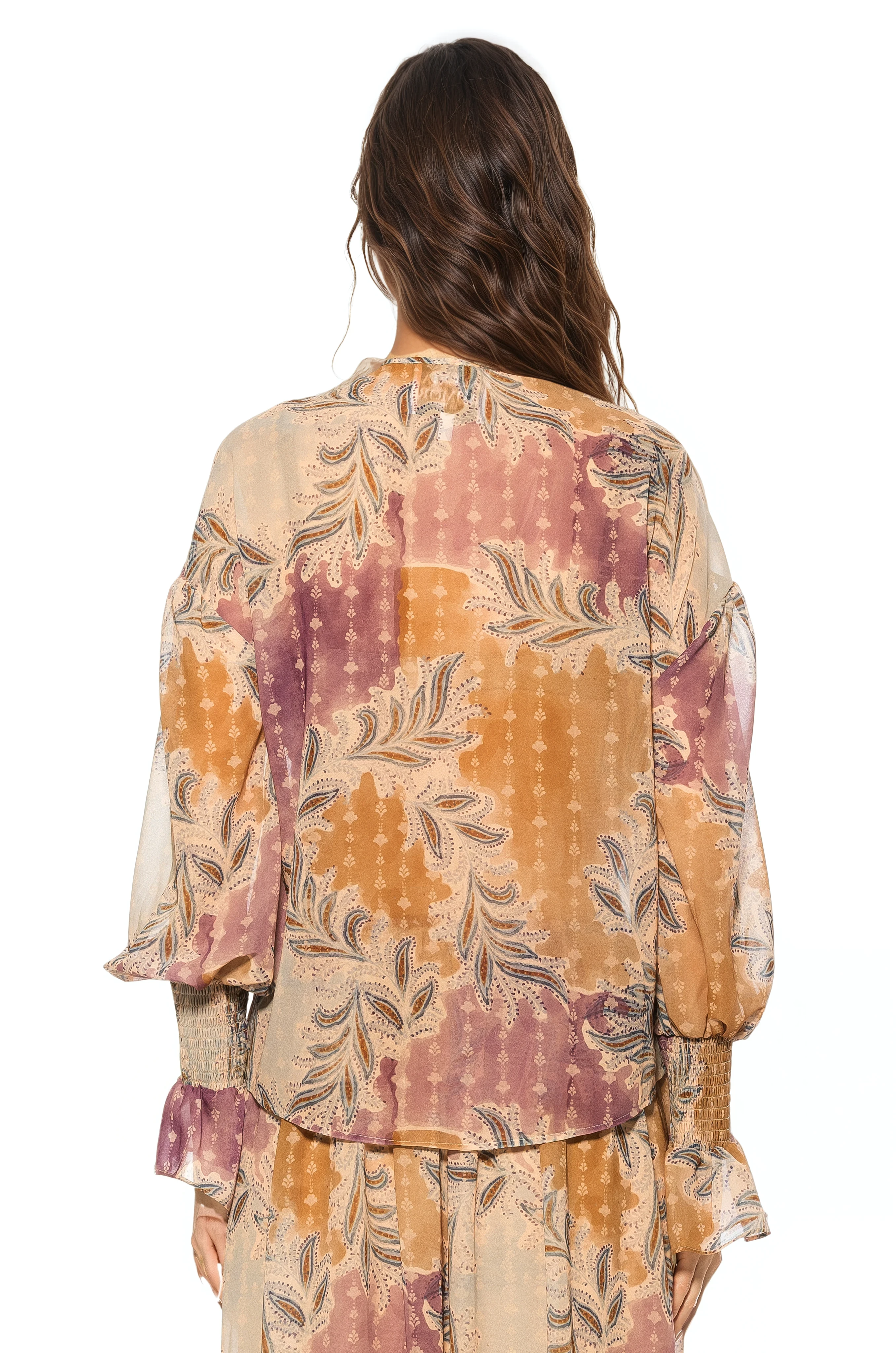 Back view paisley print ruffle blouse, shirt tail hem, blouson sleeve with smocked ruffle cuff.